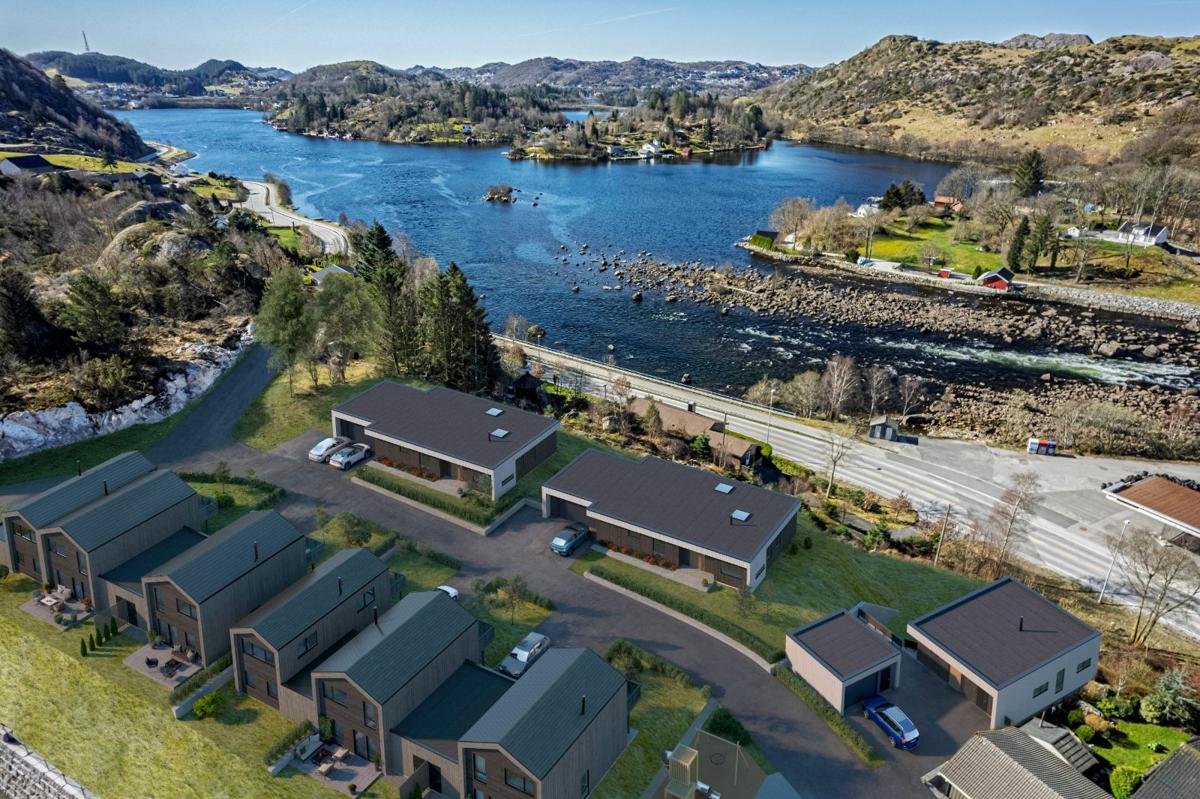 3D-illustrasjon av Vingård i Egersund sett fra luften mot øst, med boligene i kjede i forgrunnen og vannet bak